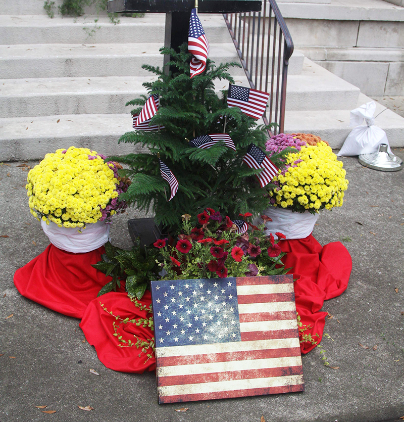 Lowe's Home Improvement donated the flowers in front of the podium at the Cleveland County Veterans Day Program on November 11th in Uptown Shelby.