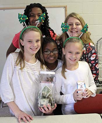 Girls on the Run Club raises money for homeless children at Christmas