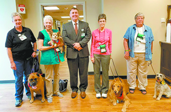 Volunteers with pets providing comfort