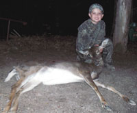 7 Year Old Bags His First Deer