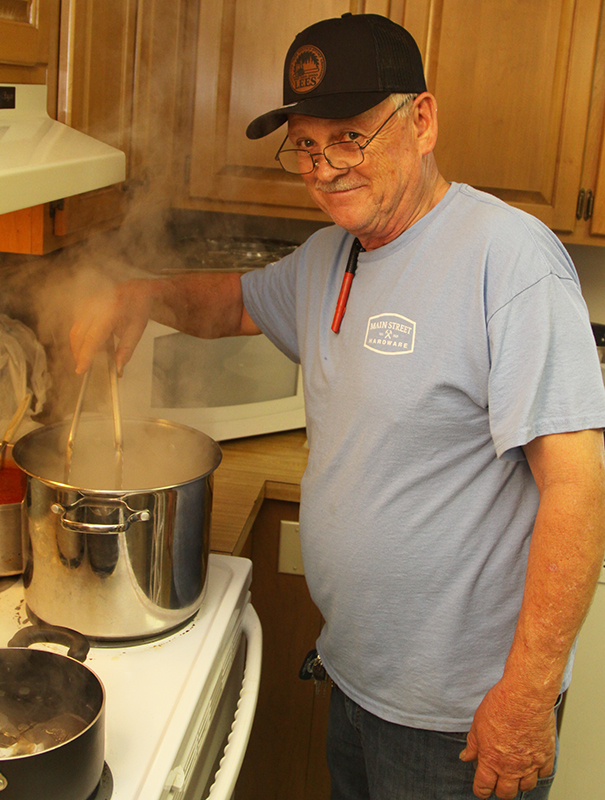 Danny Aderholdt cooks spaghetti at New Bethel Baptist Church Valentine Supper fundraiser.