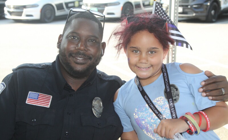 Shaunda Hill of the Shelby Police Department and Serenity Frazier had fun at the National Night Out on Tuesday, August 1st at the Bobby Bell Pavilion 