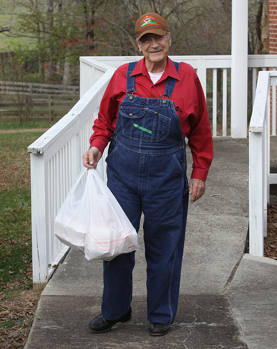 Frank Tallent picks up some takeout plates at the Pleasant Hill United Methodist Church Spaghetti Supper Fundraiser on March 11th.